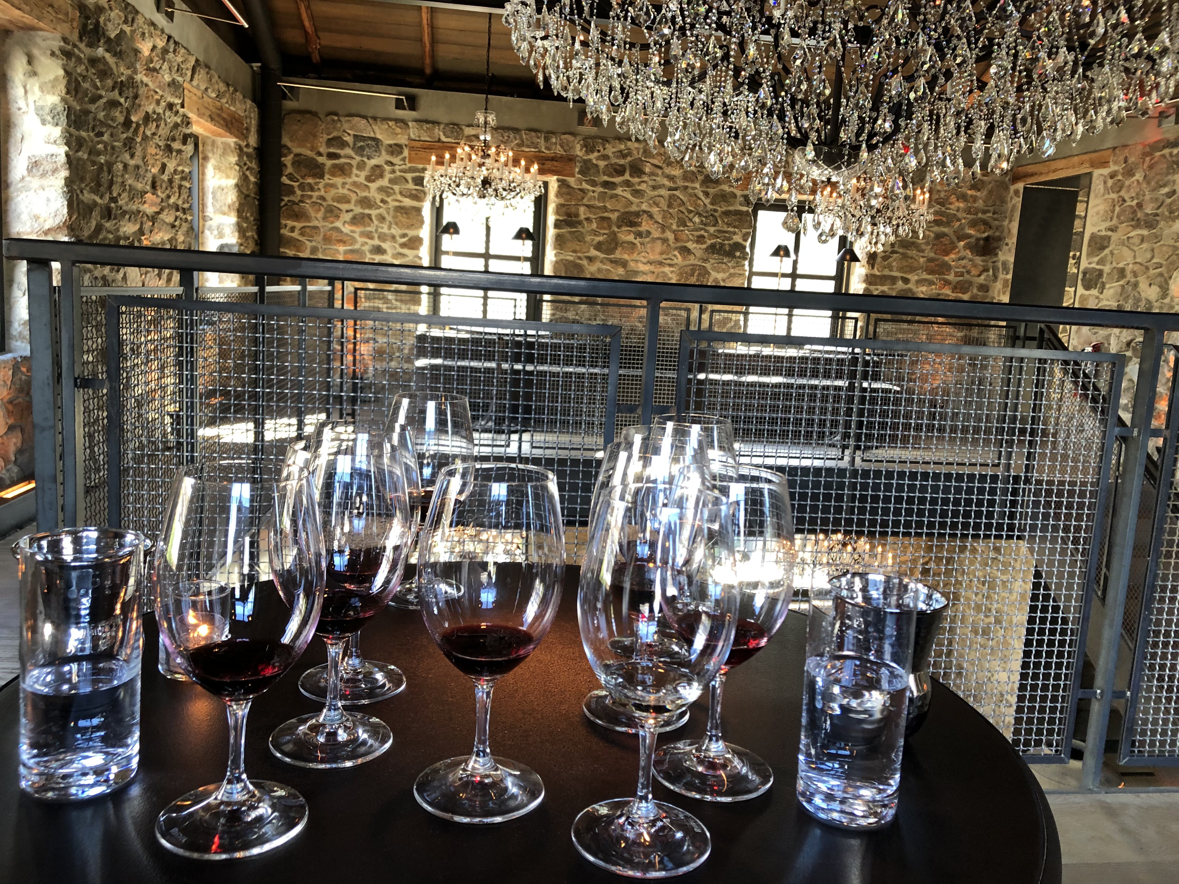 Wine glasses on a tasting room table
